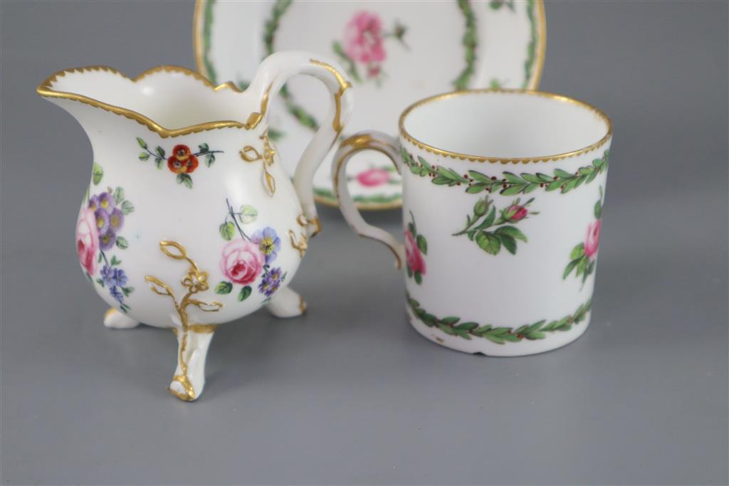 A Sevres cream jug, c.1768, and a Sevres hard paste coffee can and saucer, c.1781, (3)